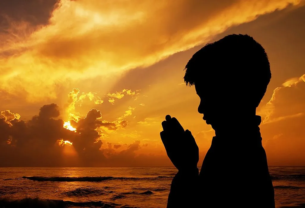 a child praying and chanting shloka