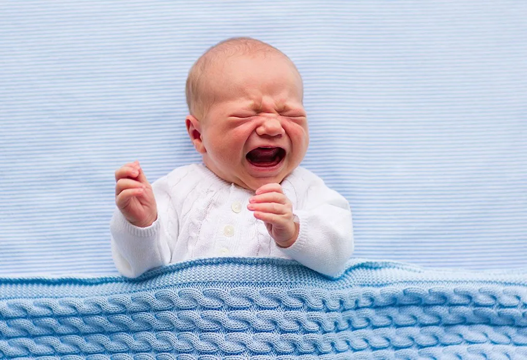 An infant crying without tears