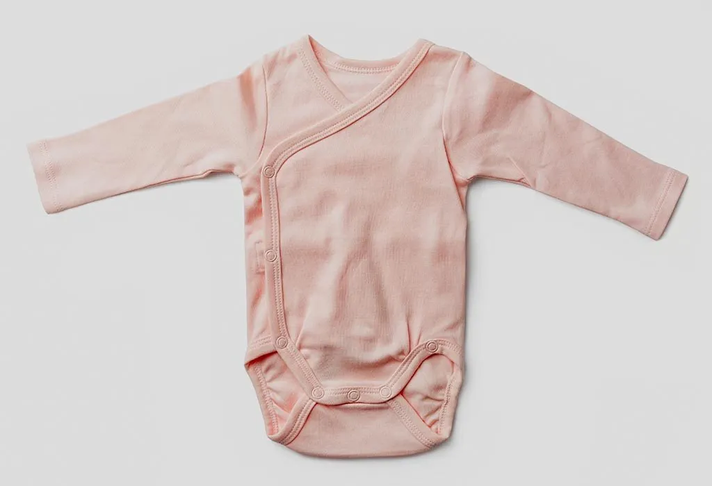 Peach-coloured bodysuit for a baby