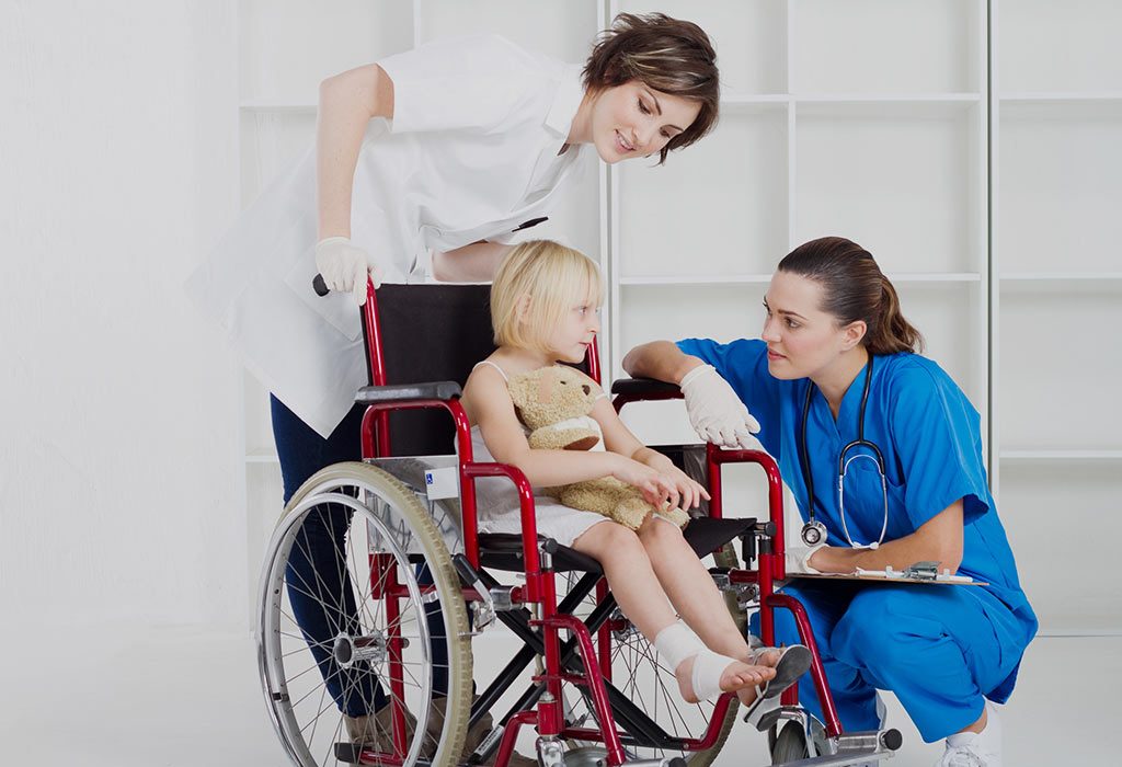 Doctor talking to a child with muscular dystrophy
