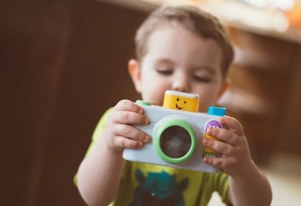 Child holding toy