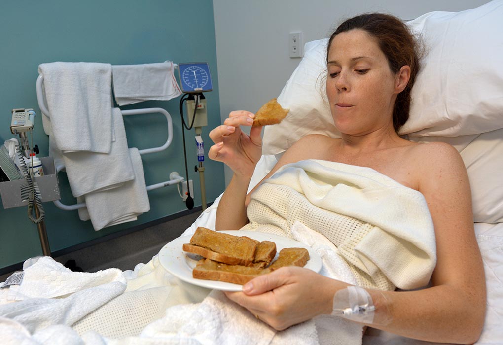 Woman eating in hospital