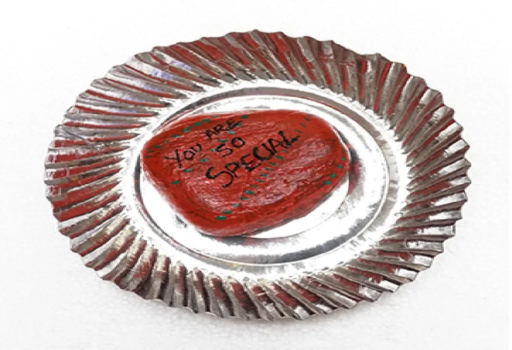 Paint on a kind quote or word on the rock.