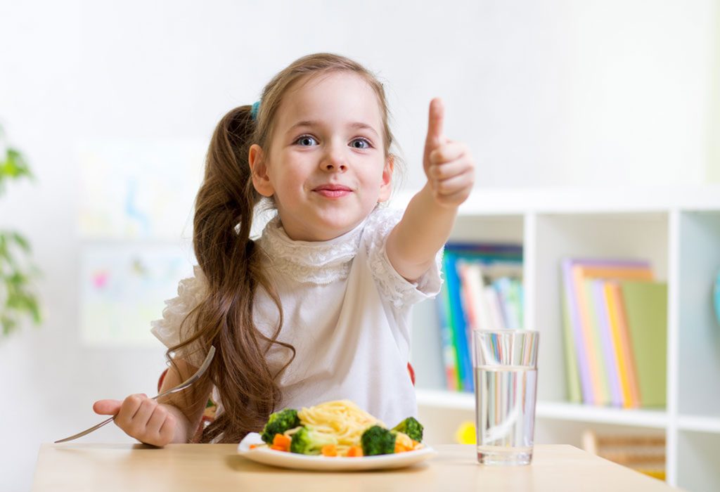 indian child eating breakfast