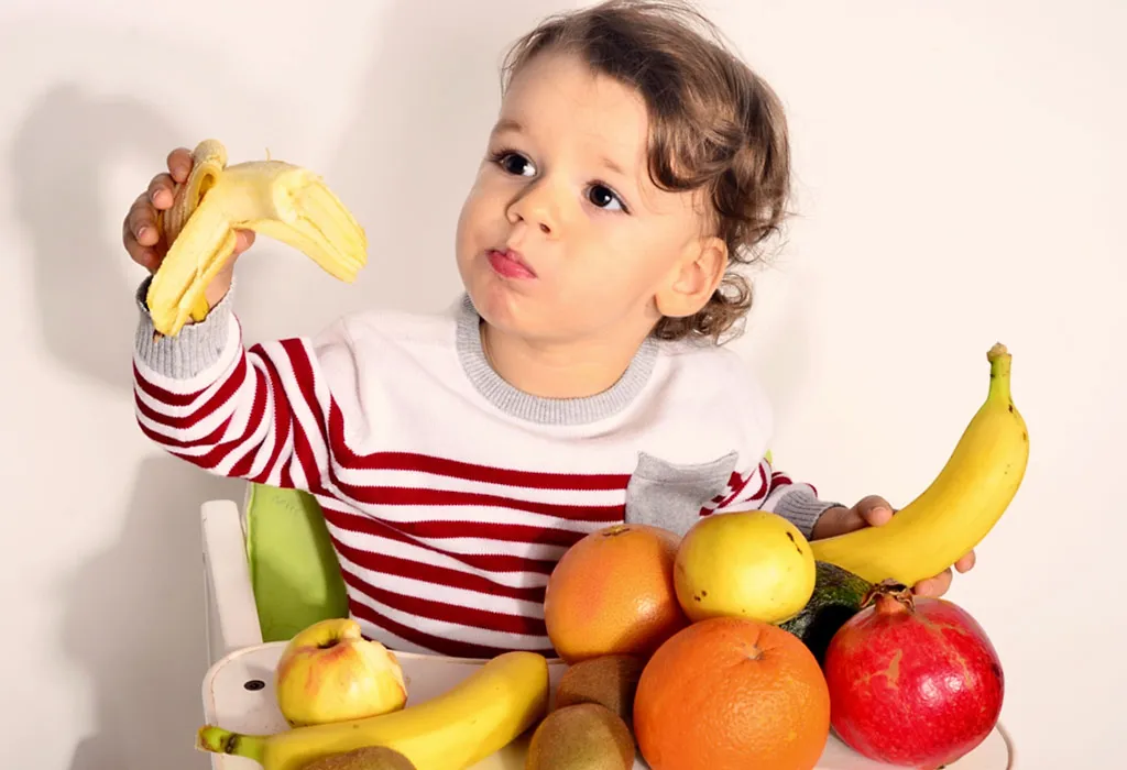 Kid having fruits