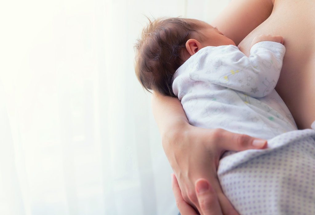 Breastfeeding From One Side: Why This Happens & How To Overcome It