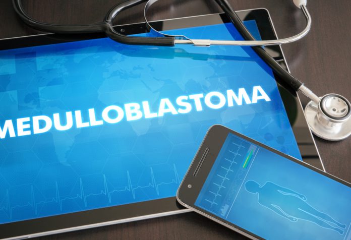 Medulloblastoma written on a tablet screen with a stethoscope kept on the side