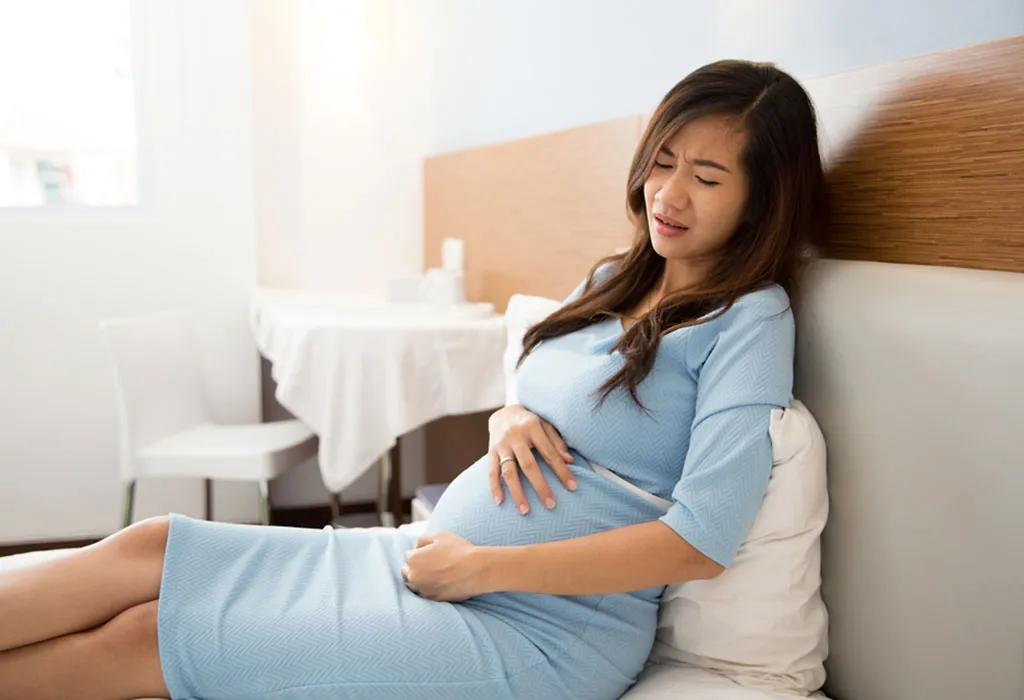 Stomach Pain While Pregnant - Causes, Signs & Treatment