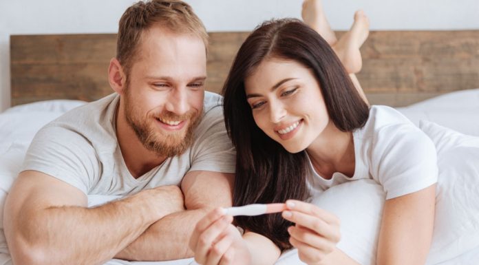 Couple looking at pregnancy test