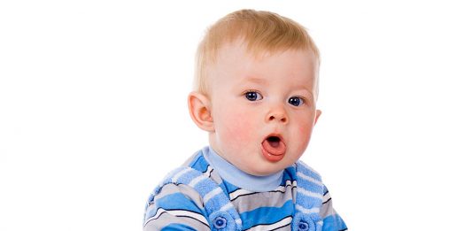 A small baby coughing