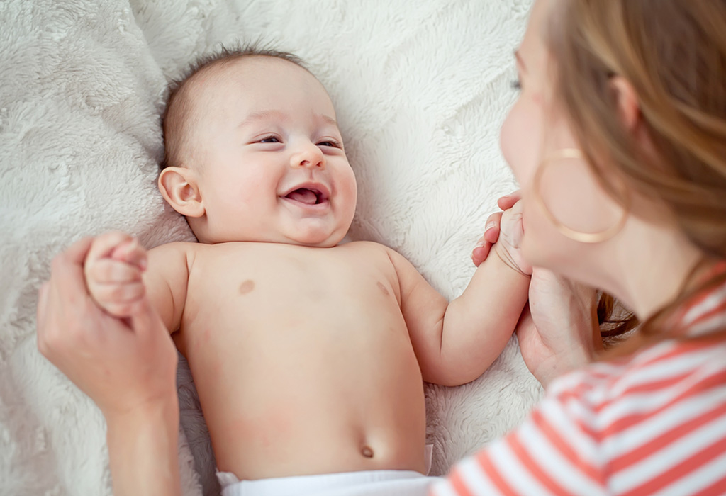 baby laughing at 1 month