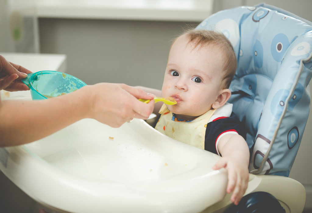 giving baby cereal at 4 months