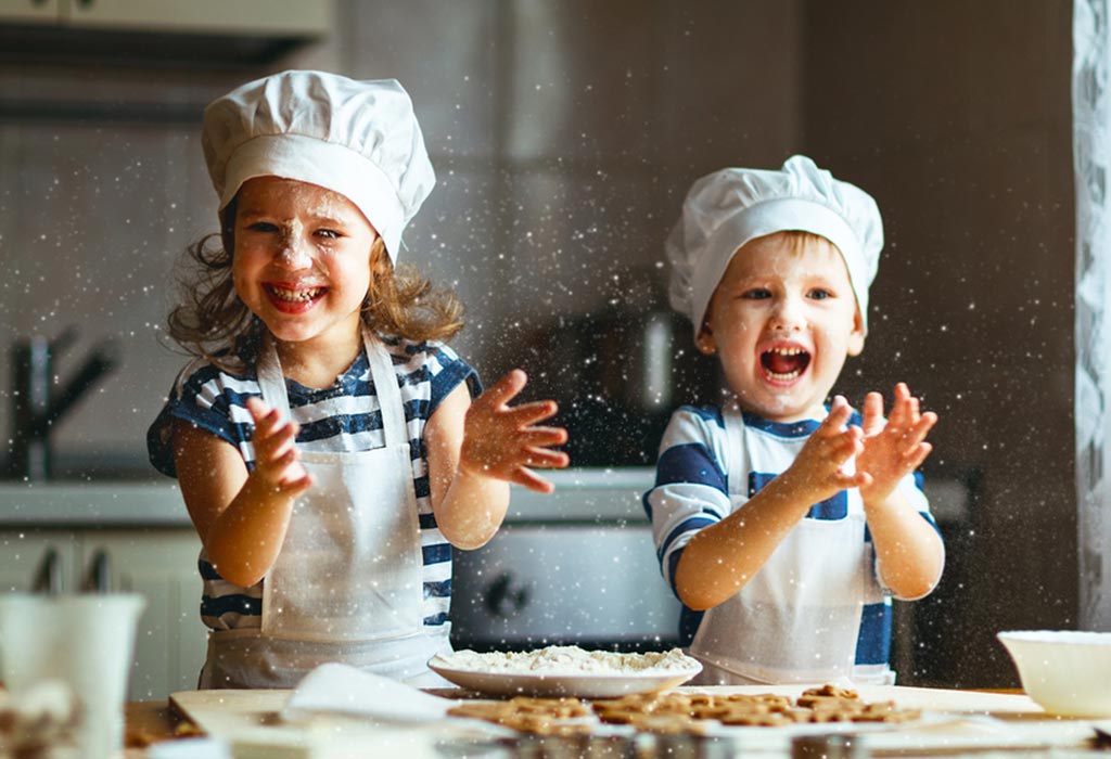 Cooking Camps for Kids Near Piedmont A little girl and a boy playing with cookie dough in the 