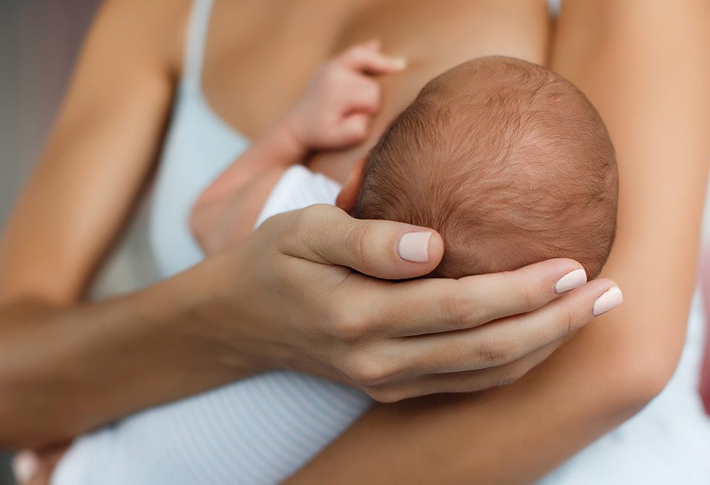Baby Sweating While Breastfeeding – Causes & Remedies