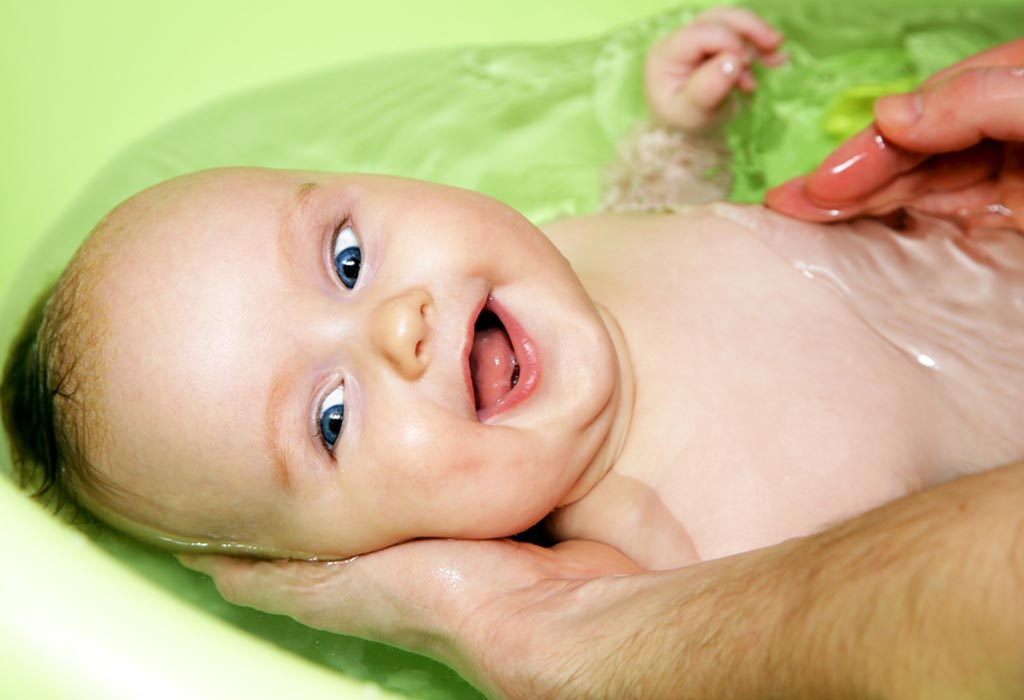 Give baby a warm bath once a day