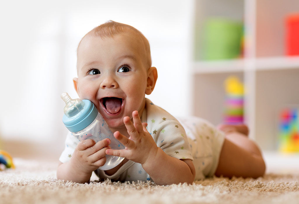When Do Babies Hold Their Own Bottle or Cup?