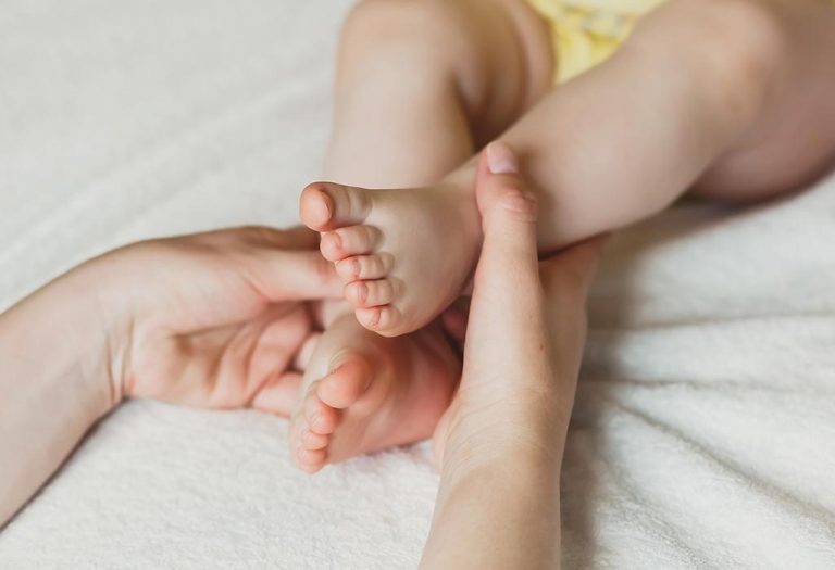 10 Week Old Baby Development, Milestones & Care Tips