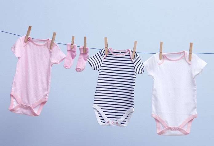 Baby clothes hanging on a rope