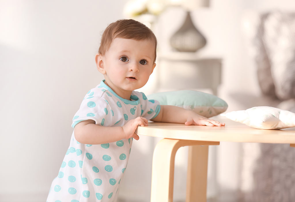 baby standing at 7 months