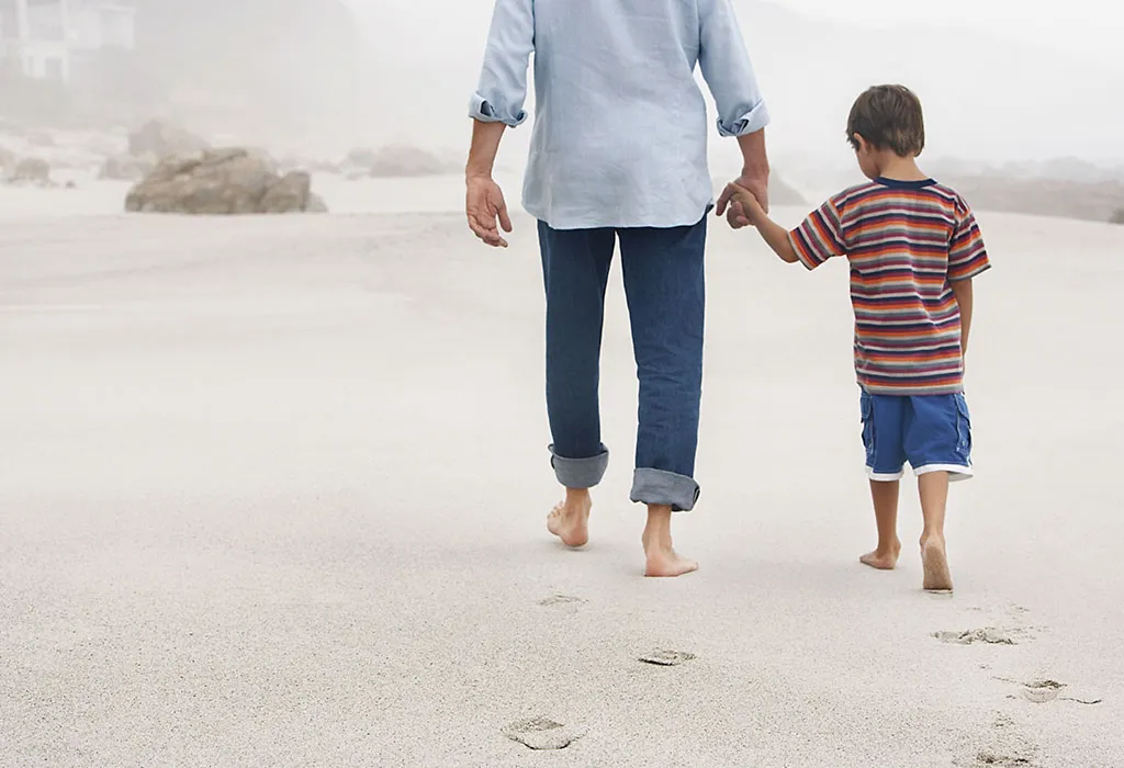 Father and son walking together