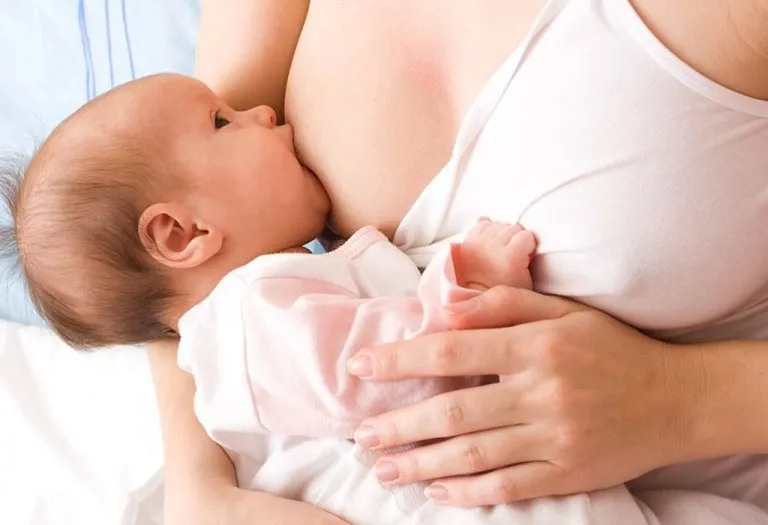 Breastfeeding With Large Breasts - Concerns & Tips for Nursing