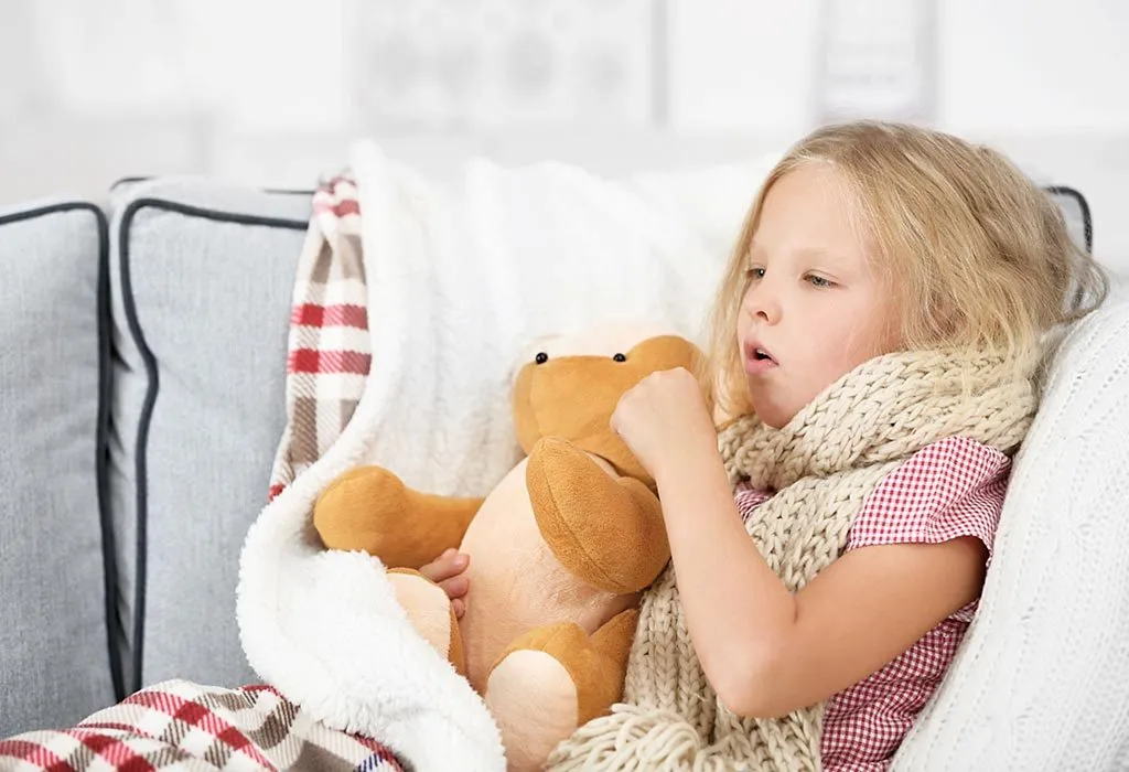 Girl suffering with sore throat and coughing
