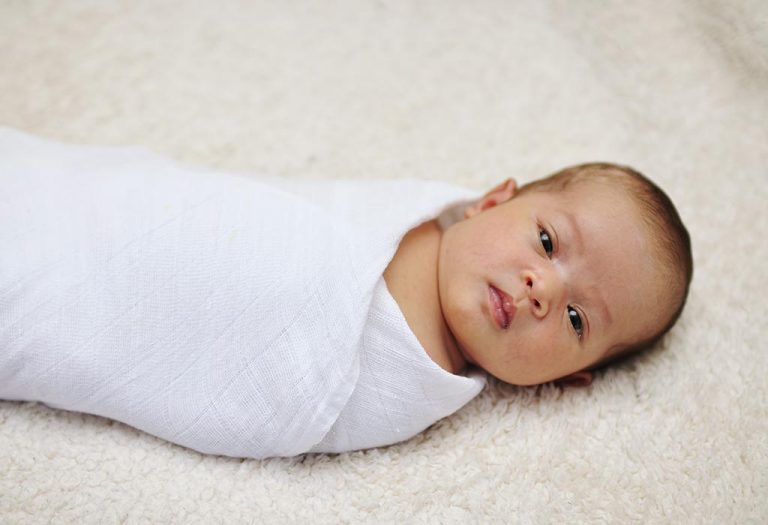 When and How to Stop Swaddling a Baby