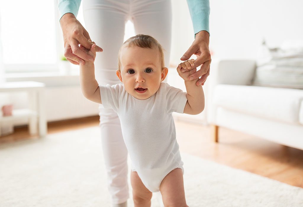 7 month old baby standing