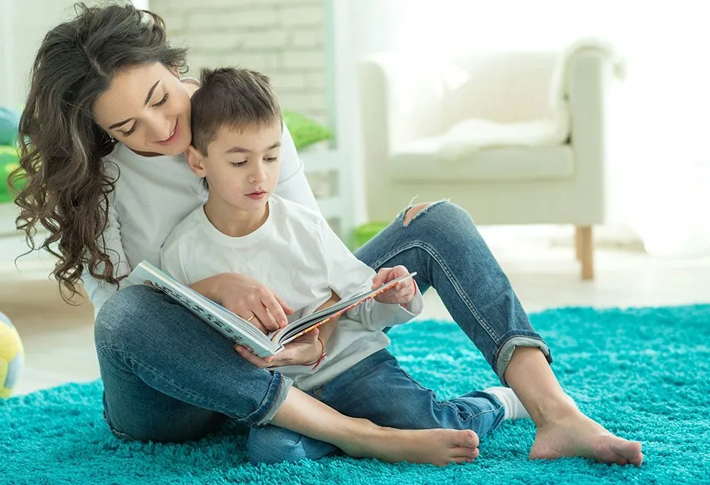 Mommy reader. Reads book to children son and daughter.