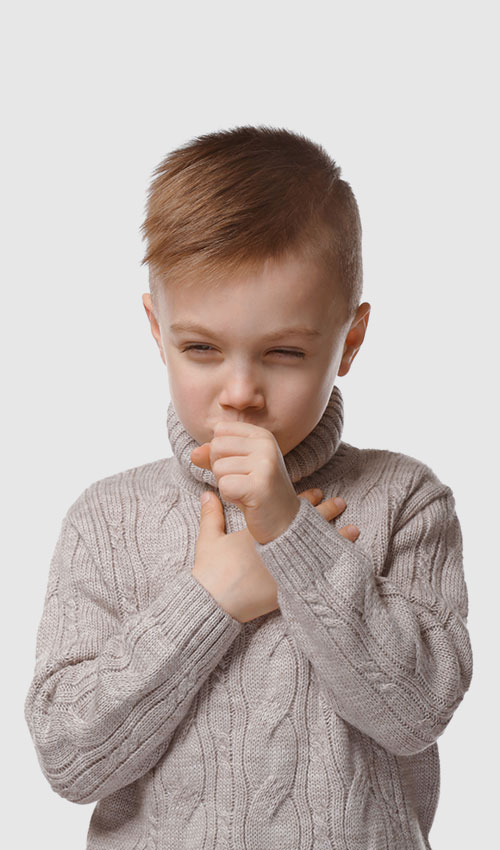 A little boy coughing