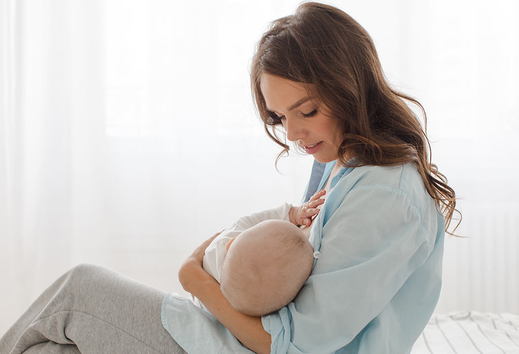 mother breastfeeding a baby