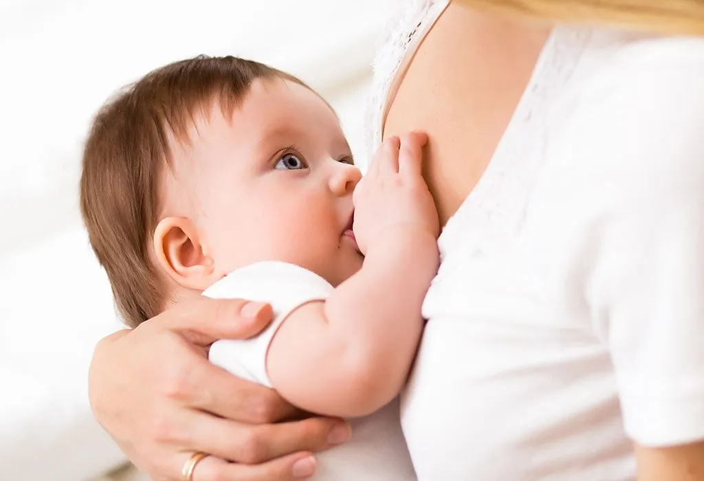 Baby crying store while breastfeeding