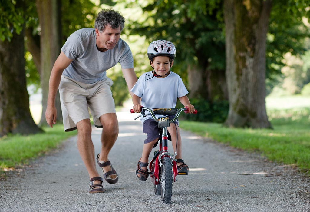 a kid riding a bike