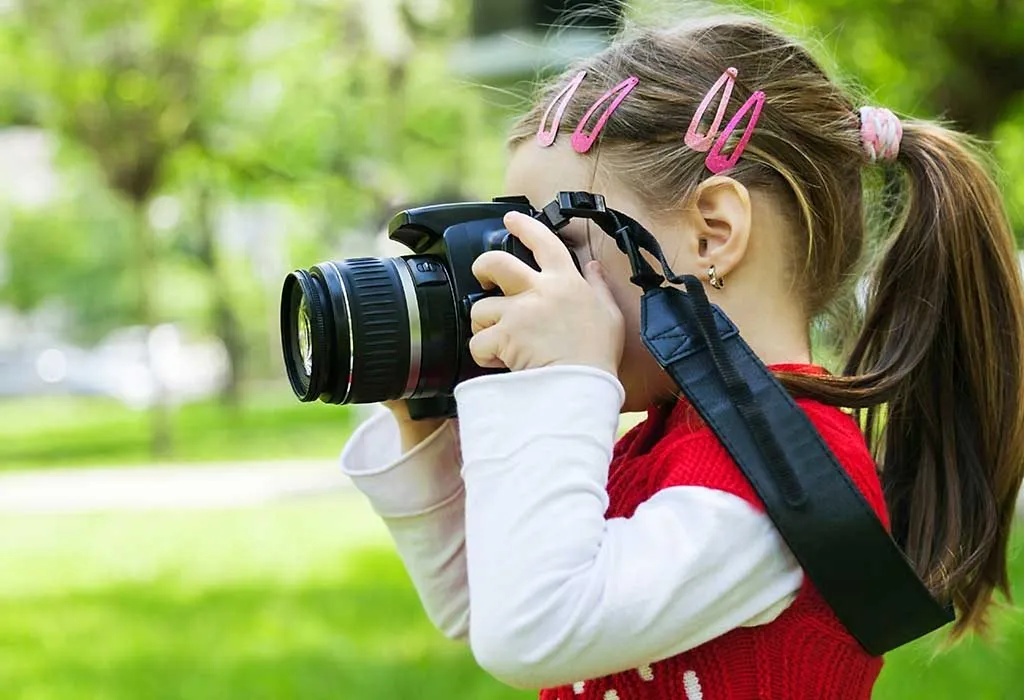A GIRL TAKING PICTURES