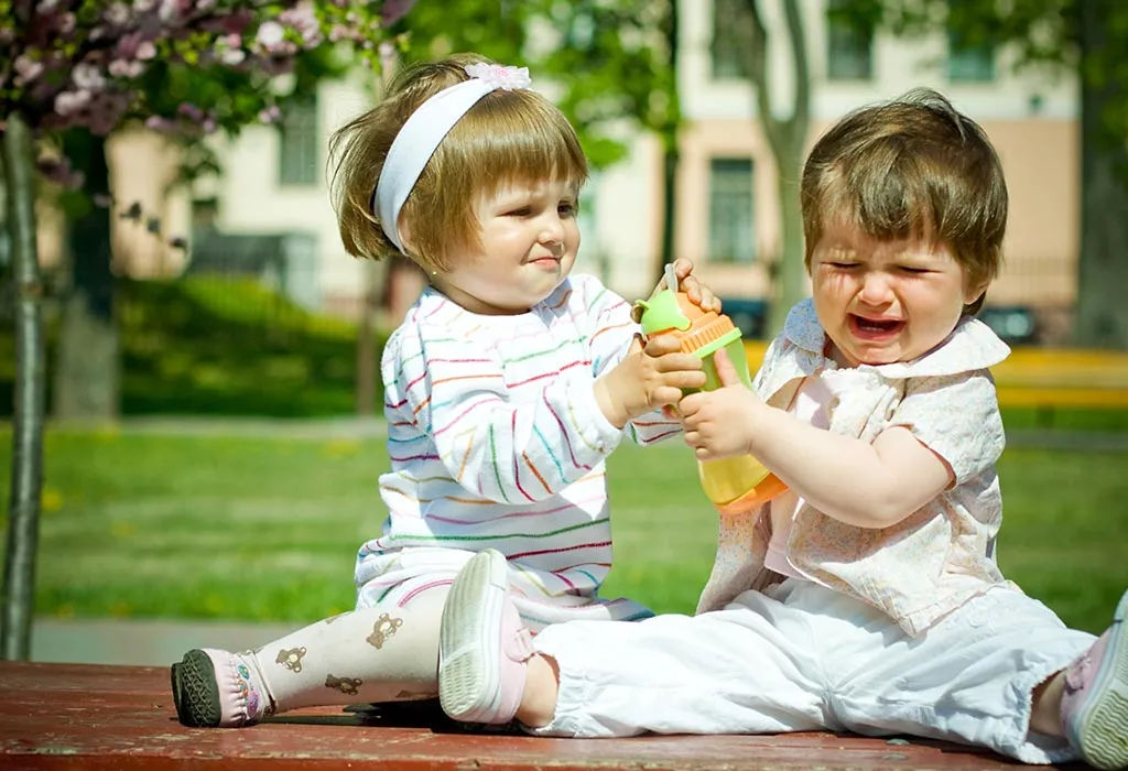 two toddlers fighting