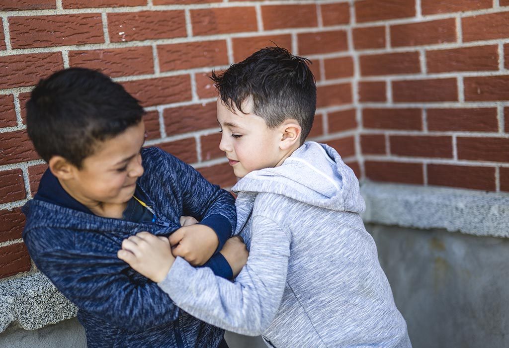 Two boys fighting