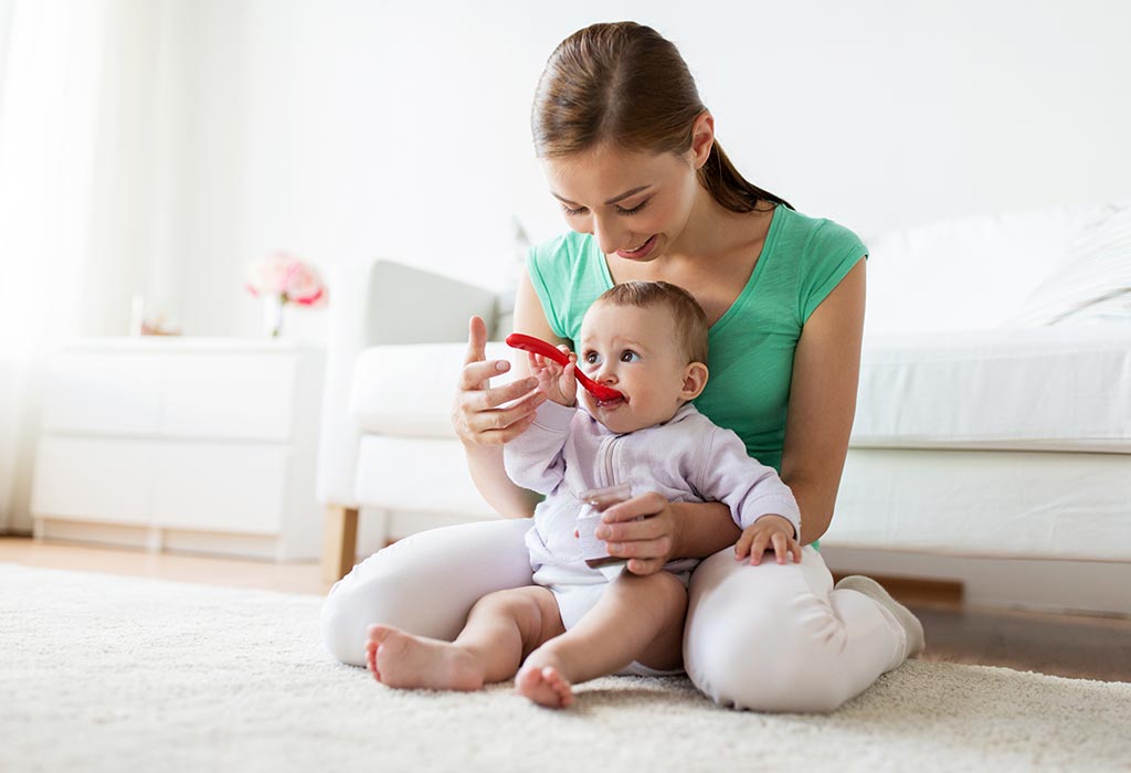 mother feeding baby