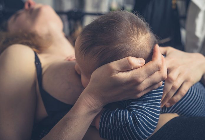 Back Pain while Breastfeeding - Causes and Tips to Relief