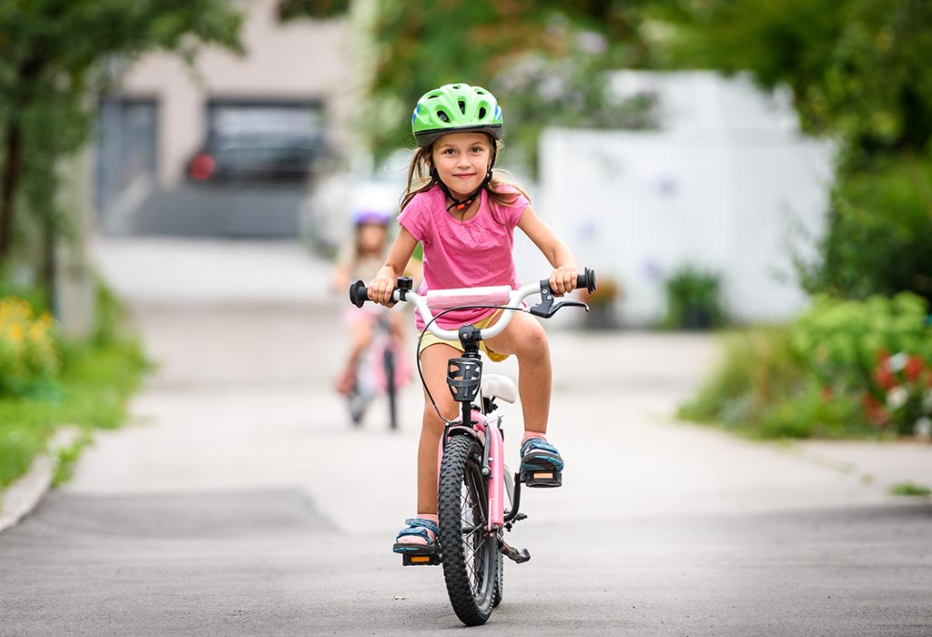 children driving bike