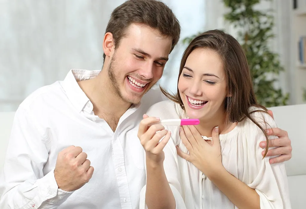 Couple checking pregnancy test