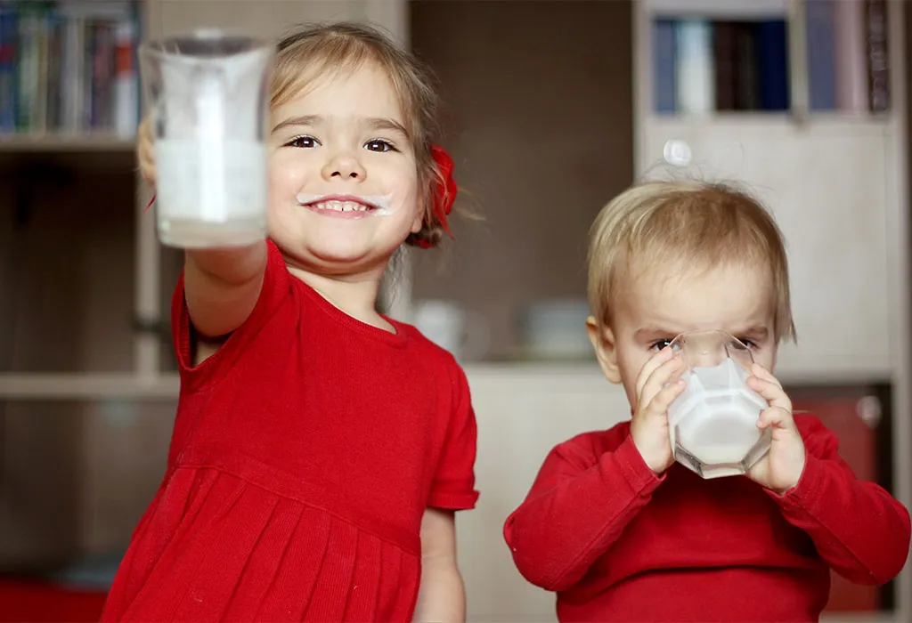  children drinking milk