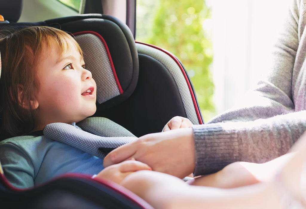 baby sitting forward in car seat