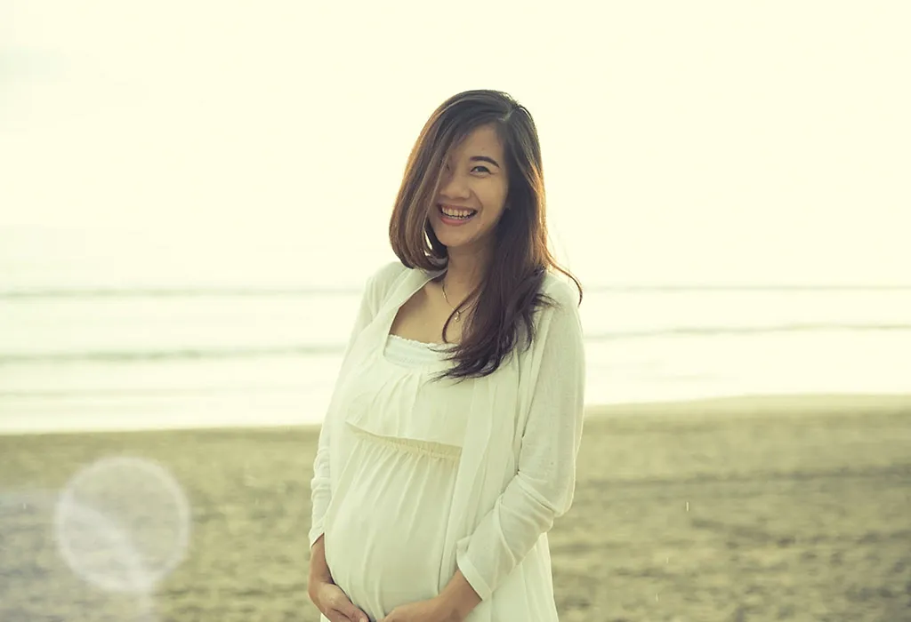 Woman proud of her baby bump Woman proud of her baby bump
