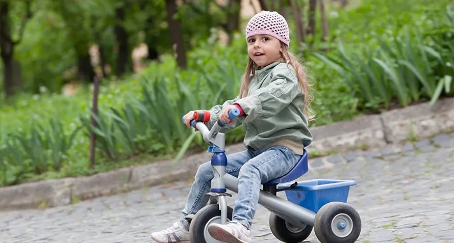 Riding a hot sale tricycle