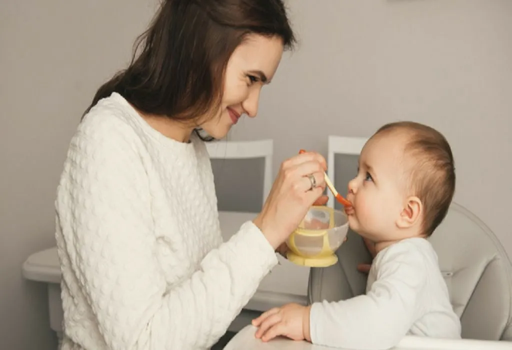 Spoon Feeding Breastmilk to a Newborn 