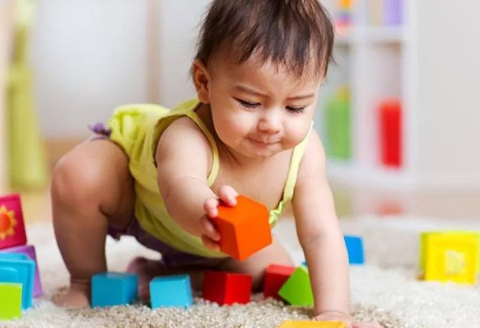 how soon can your baby play with stacking blocks