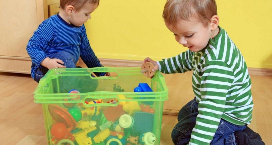 Toddlers Shifting Objects In and Out of Containers