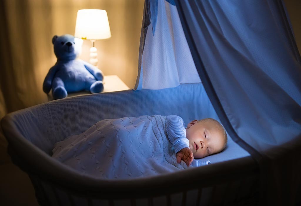 Baby sleeping in crib at night