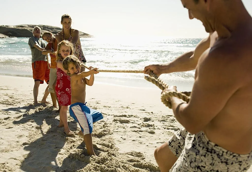 Playing tug-of-war at the beach