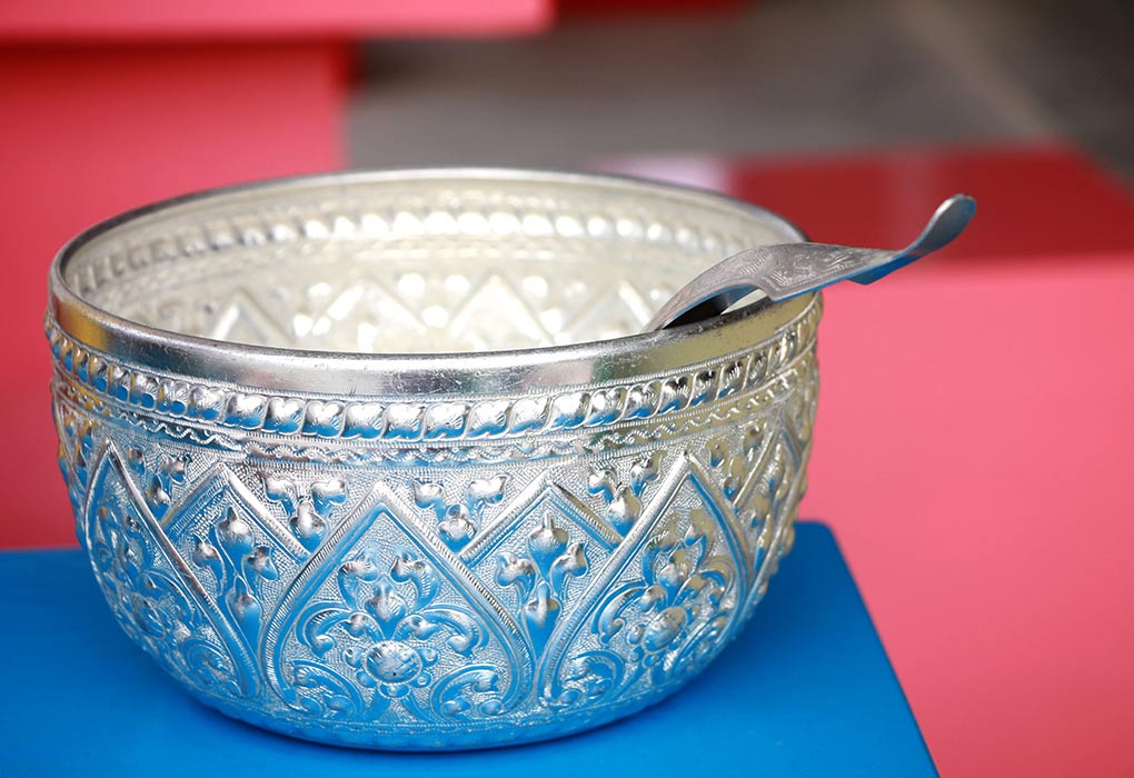 silver bowl and spoon for baby feeding